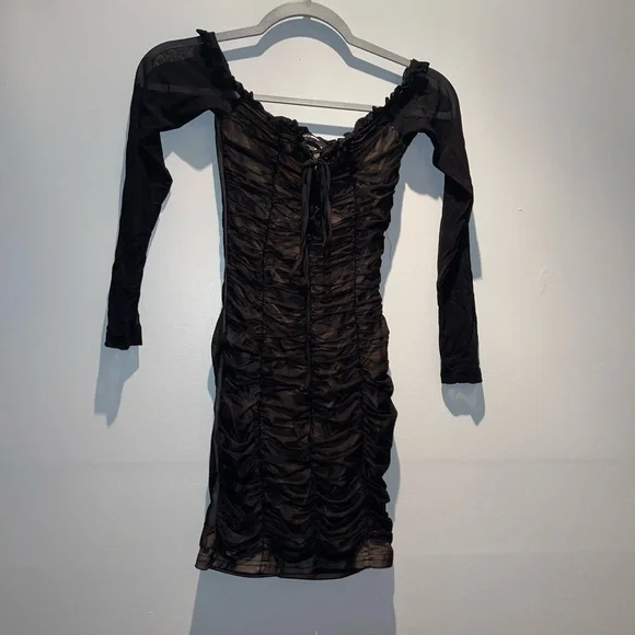 kim k black ruched dress Kim Kardashian loves a ruched dress: The best bodycon looks for spring